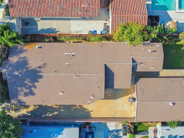 an aerial view of house with yard