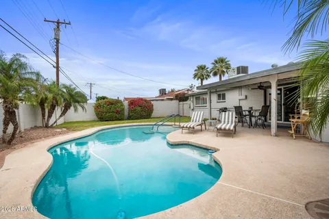 a view of a house with swimming pool