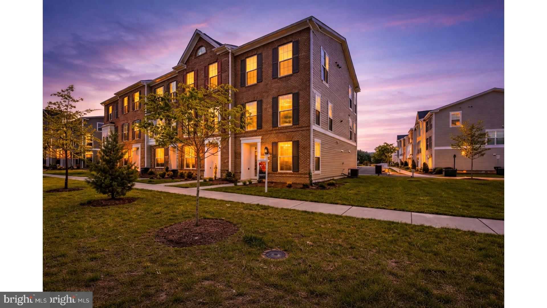 a view of a building with a yard
