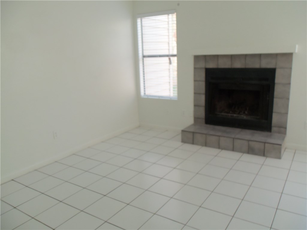 8705 Schick Road, Unit C Austin, TX 78729 - Photo 1 of 1 an empty room with windows