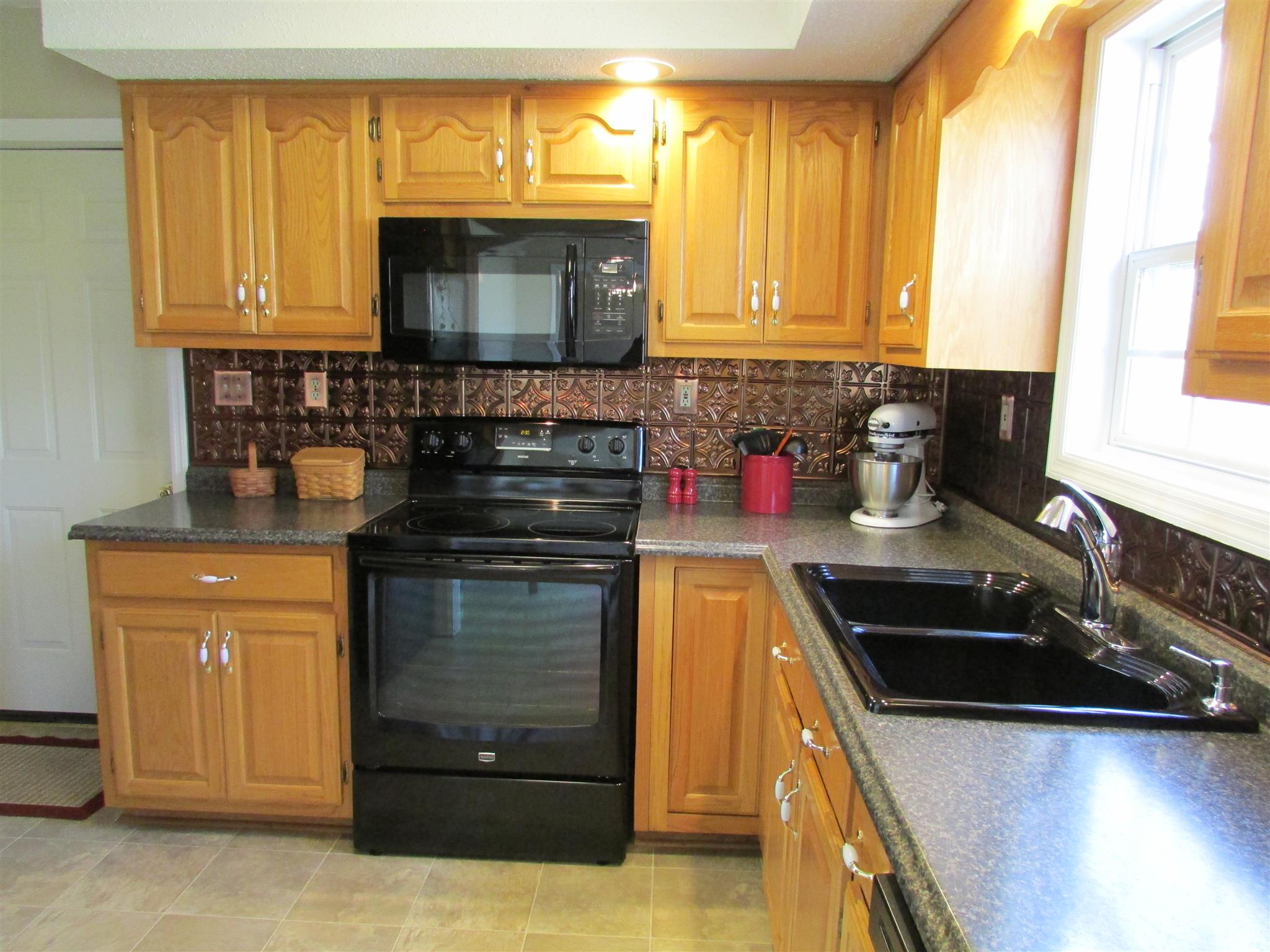 1550 Center Star Road Columbia, TN 38401 - Photo 12 of 30 a kitchen with a stove and a sink