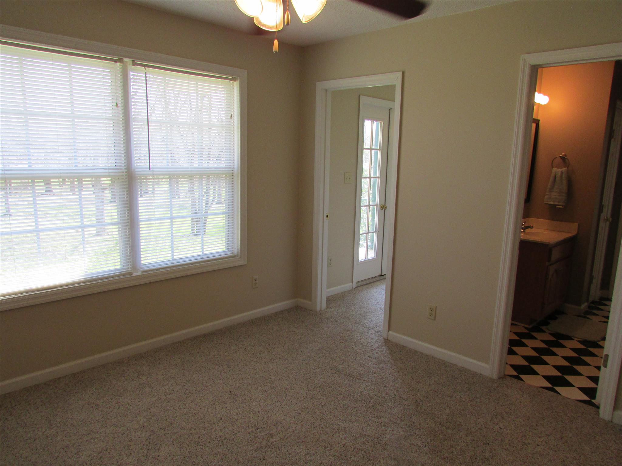1550 Center Star Road Columbia, TN 38401 - Photo 19 of 30 an empty room with windows and closet