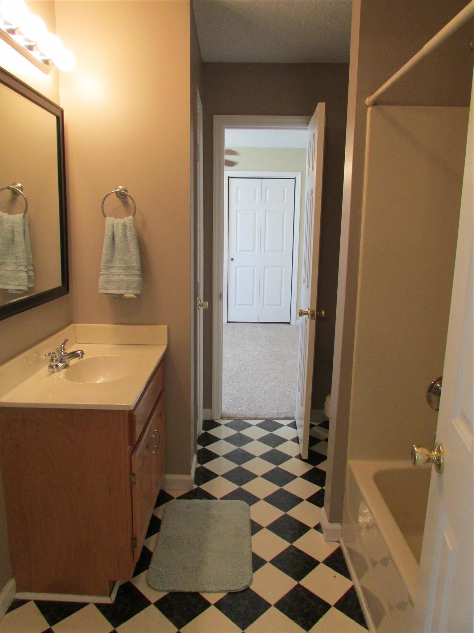 1550 Center Star Road Columbia, TN 38401 - Photo 21 of 30 a bathroom with a sink and a mirror