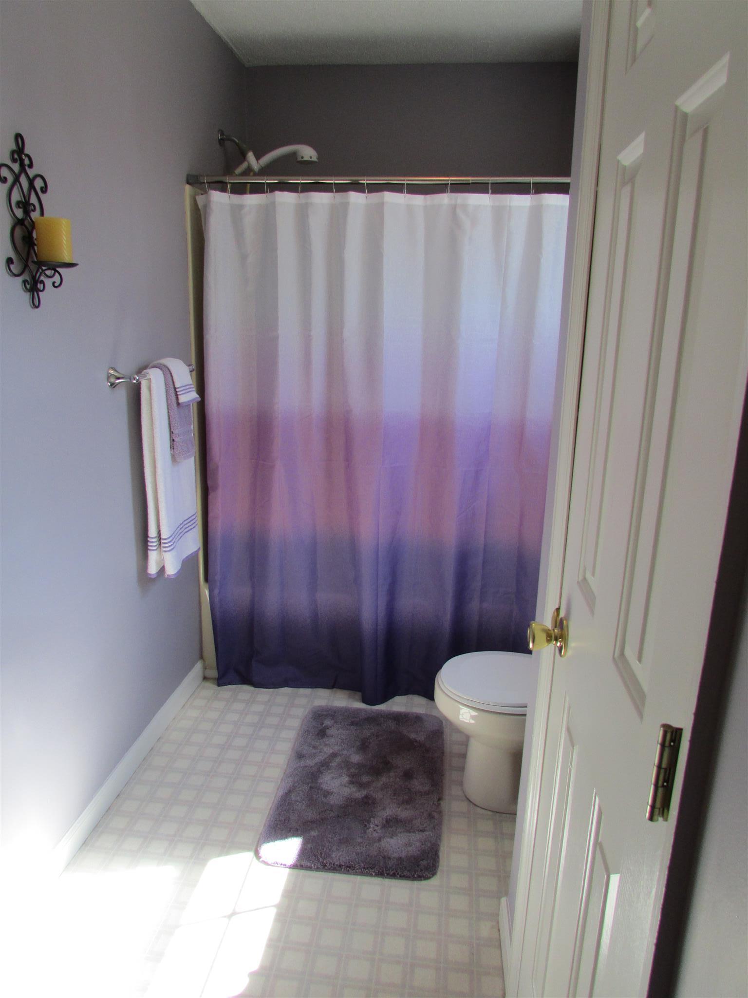 1550 Center Star Road Columbia, TN 38401 - Photo 28 of 30 a view of a bathroom with tub and shower