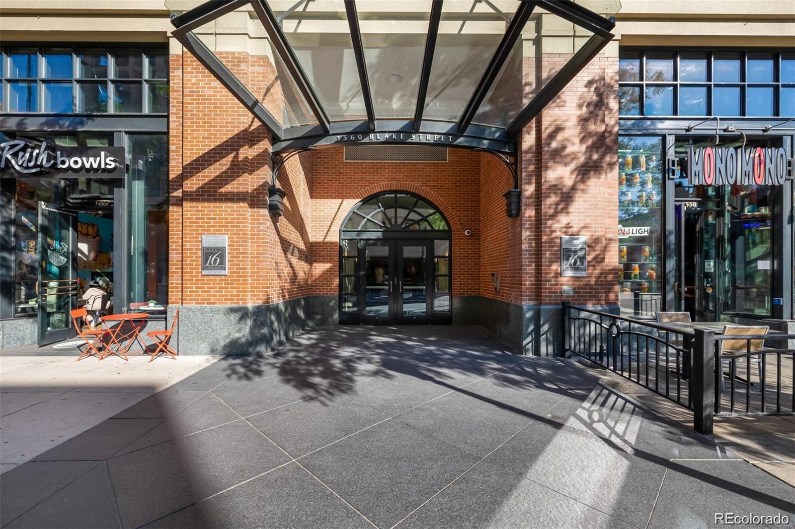 1560 Blake Street, Unit 810 Denver, CO 80202 - Photo 47 of 48 a view of a building with sitting area