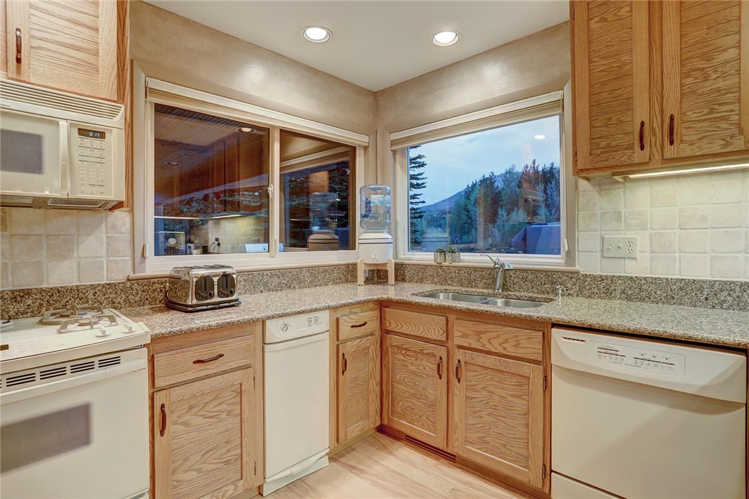 385 Riverside Drive Silverthorne, CO 80498 - Photo 9 of 35 Large windows that look out at the river! Note: The appliances in these photos will be upgraded!