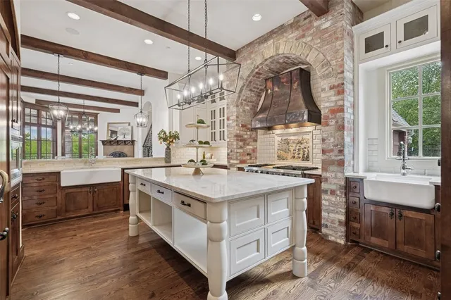 a kitchen with a stove and a sink