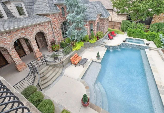 an outdoor sitting area with furniture