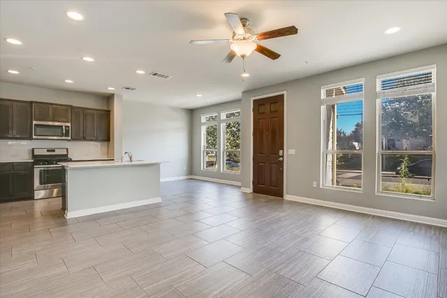 a view of empty room with windows