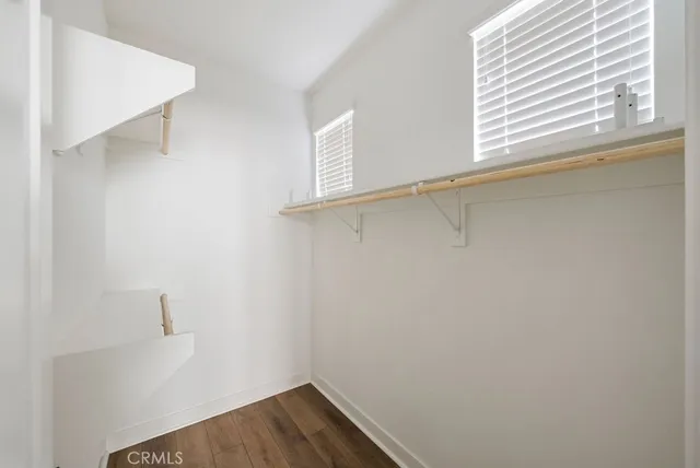 a view of a room that has a window in it