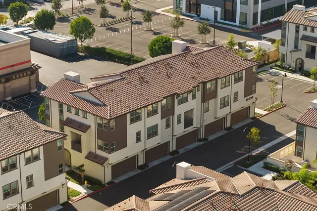 a view of a white building among the street
