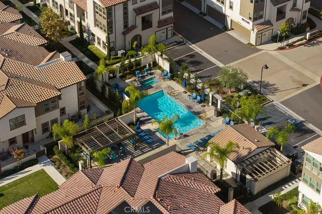 a view of a chairs and table in the patio