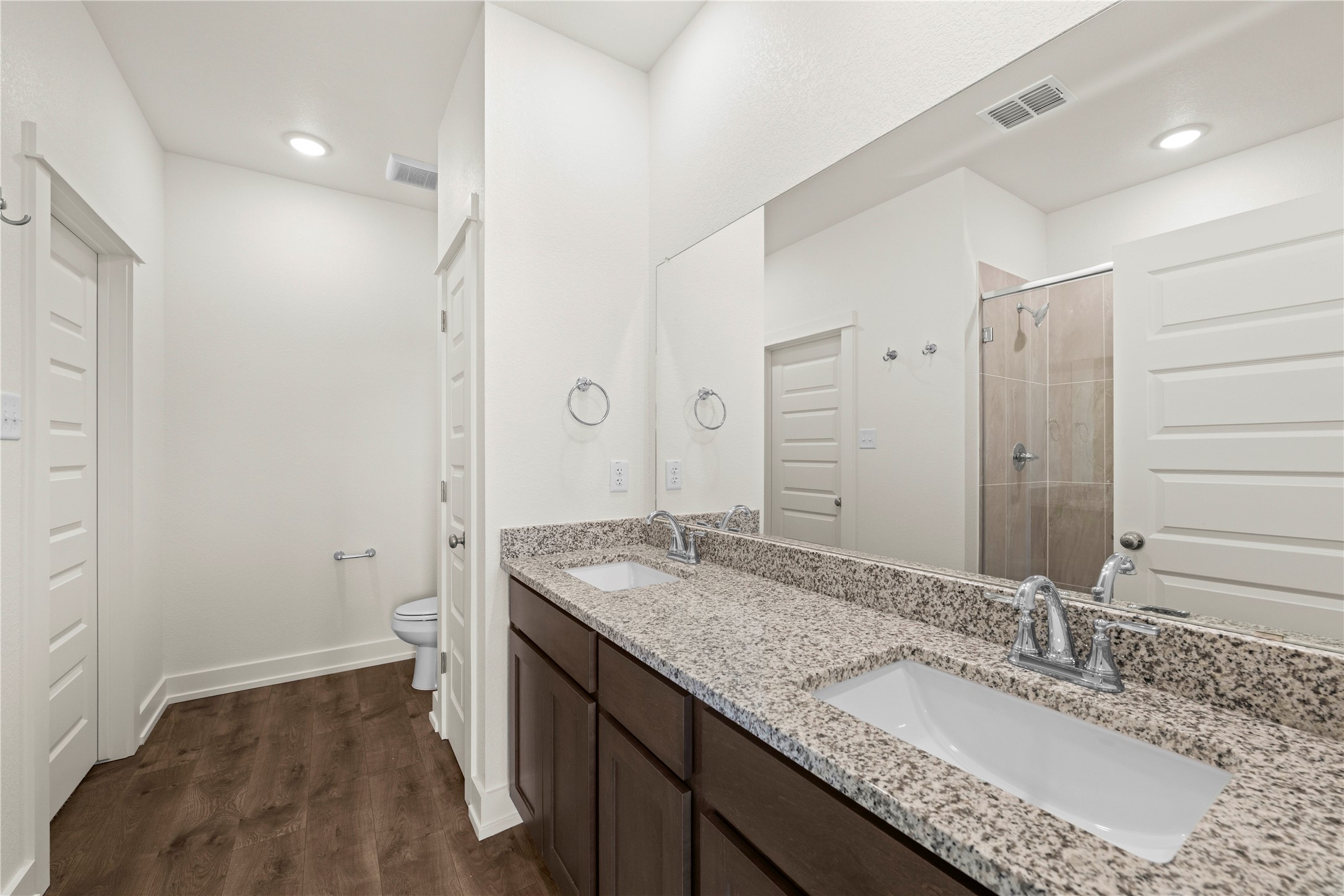 552 Gus Loop Georgetown, TX 78626 - Photo 15 of 23 a bathroom with a granite countertop sink and a mirror