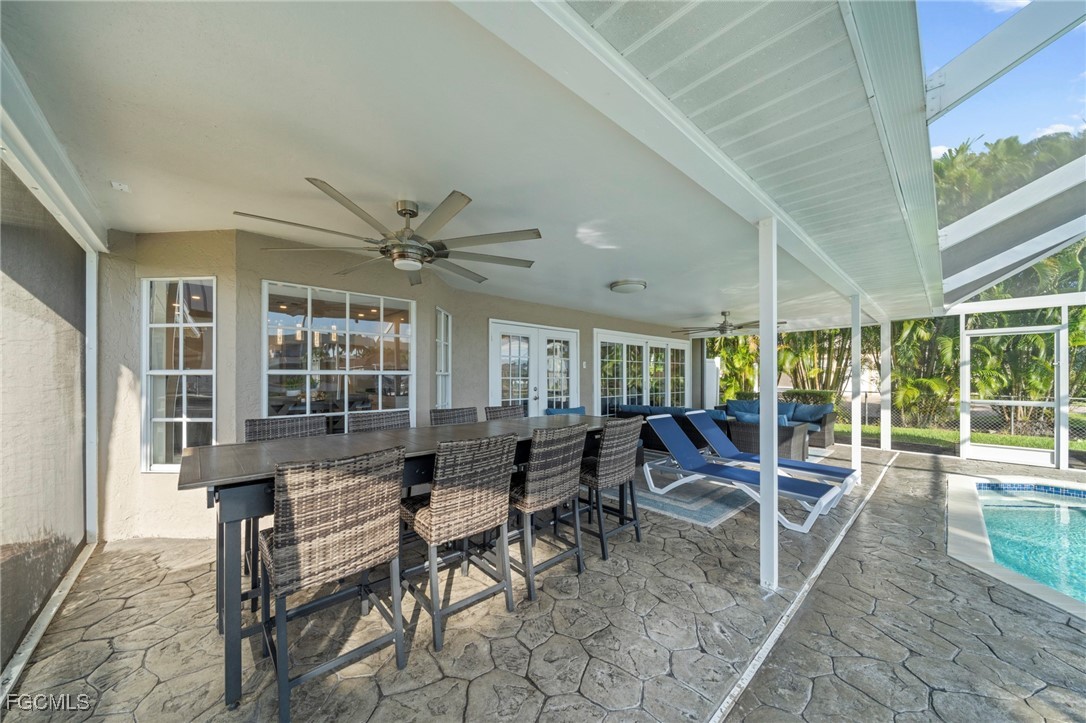 5303 Southwest 26th Court Cape Coral, FL 33914 - Photo 30 of 45 a view of a dining room with furniture window and outside view