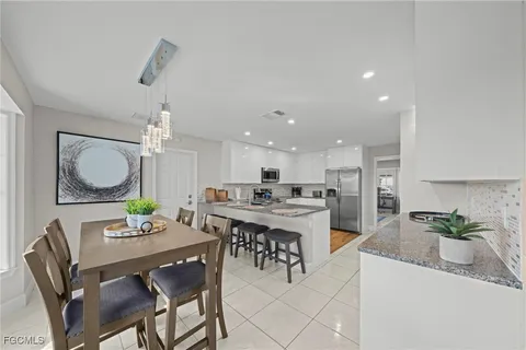 a view of a dining room with furniture
