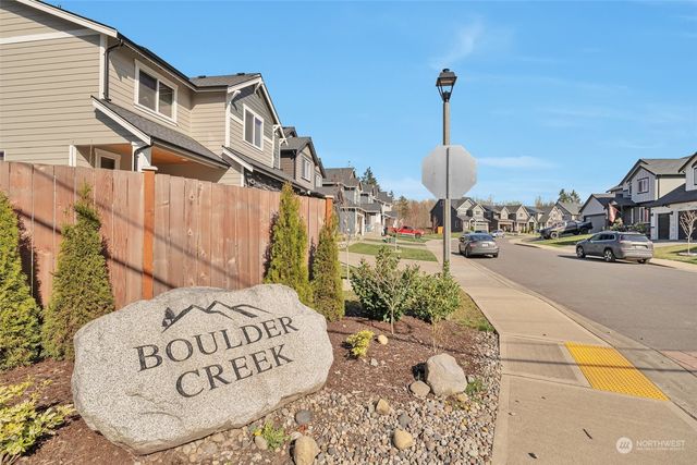 a view of a street with houses