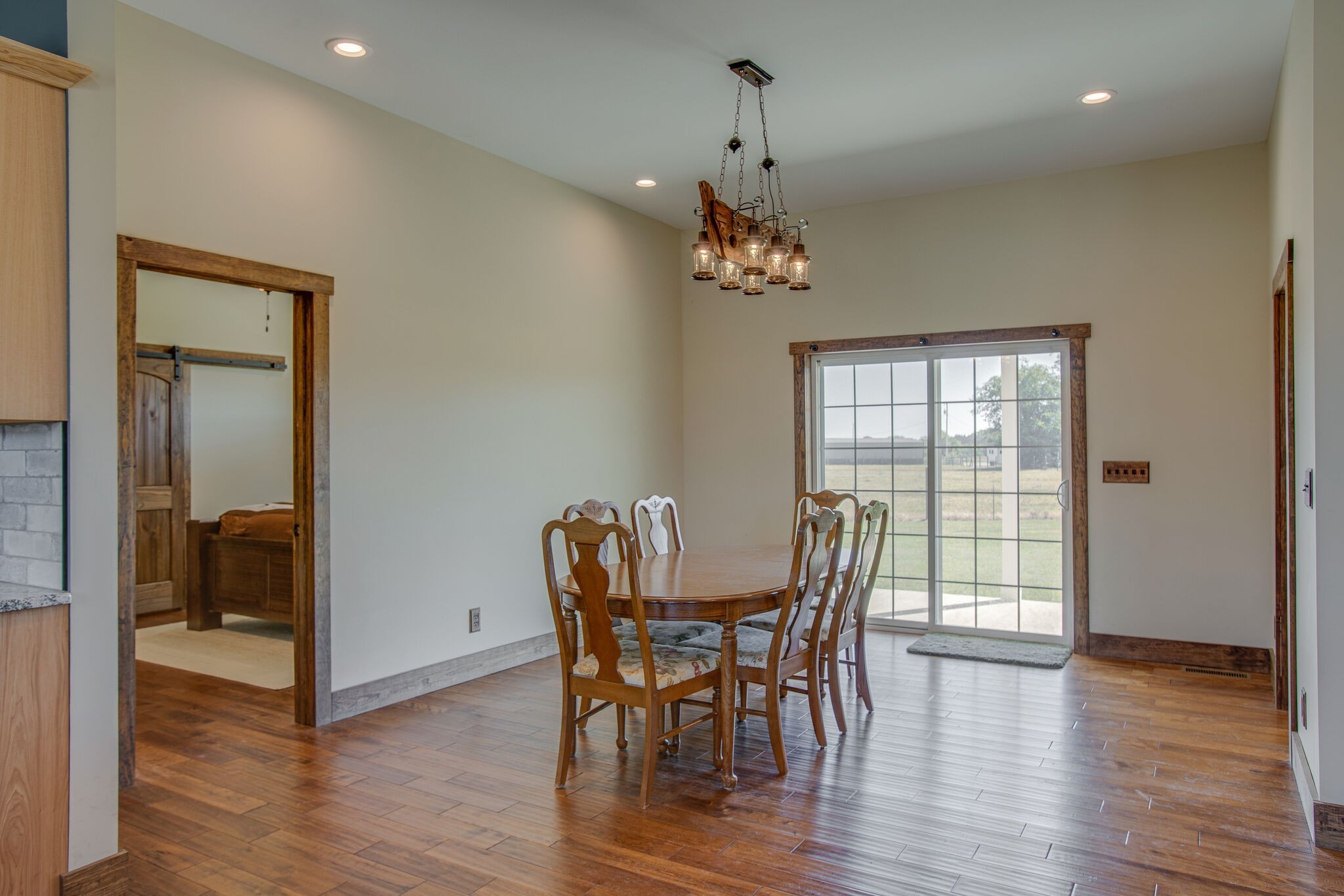 103 Heath Branch Road Chapel Hill, TN 37034 - Photo 17 of 49 a view of a dining room with furniture wooden floor and a chandelier
