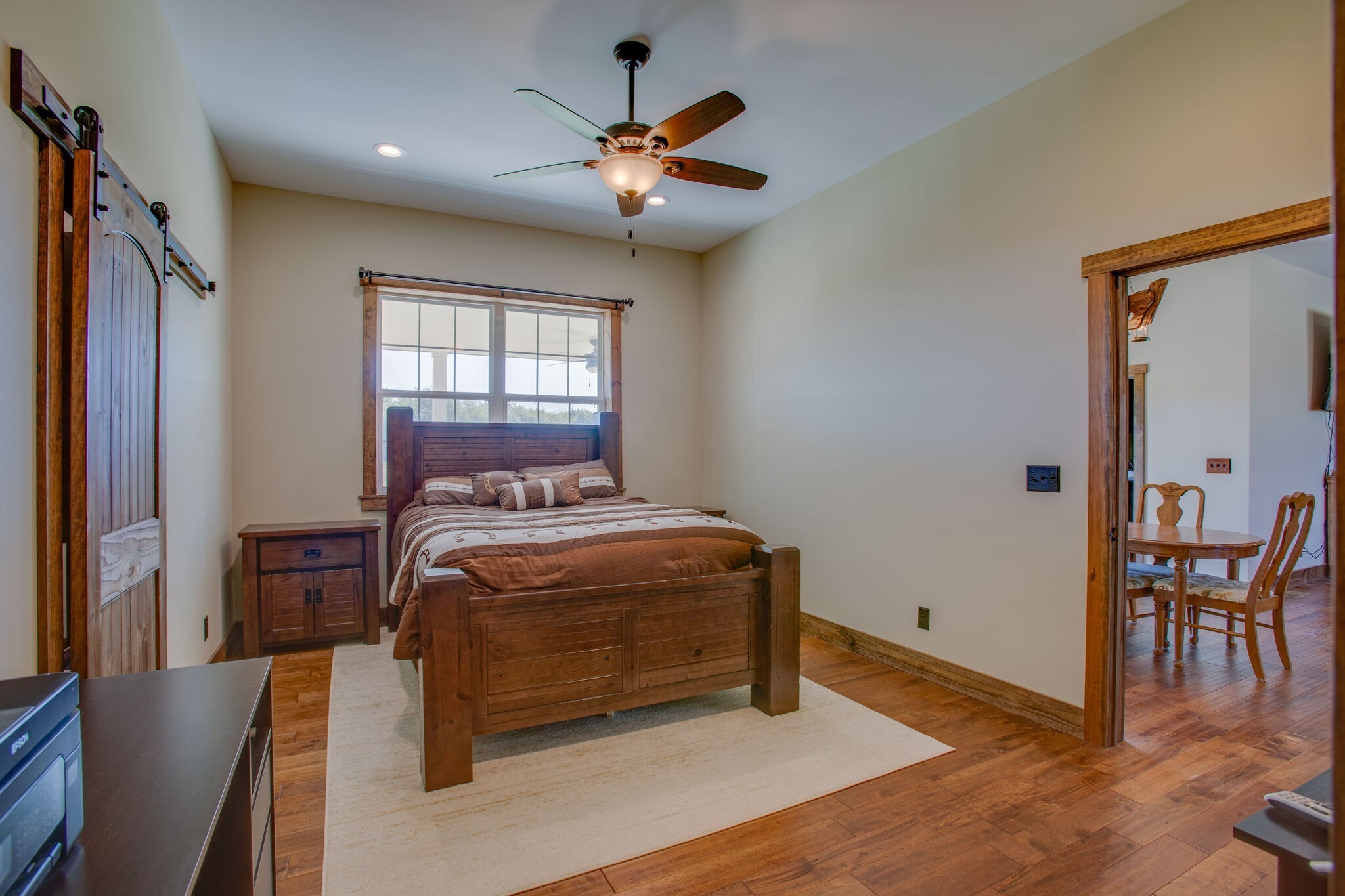 103 Heath Branch Road Chapel Hill, TN 37034 - Photo 19 of 49 a bedroom with a bed and a chandelier