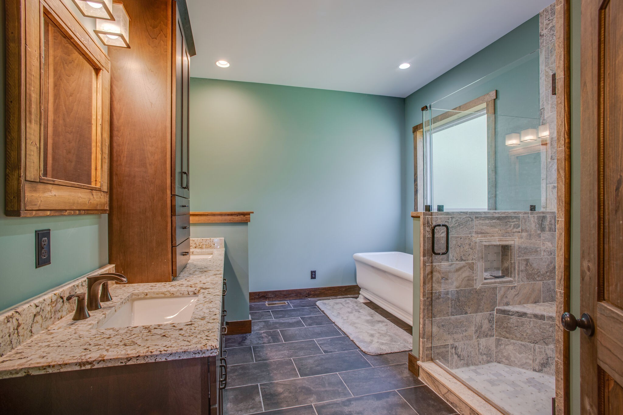 103 Heath Branch Road Chapel Hill, TN 37034 - Photo 20 of 49 a bathroom with a granite countertop sink a mirror and shower
