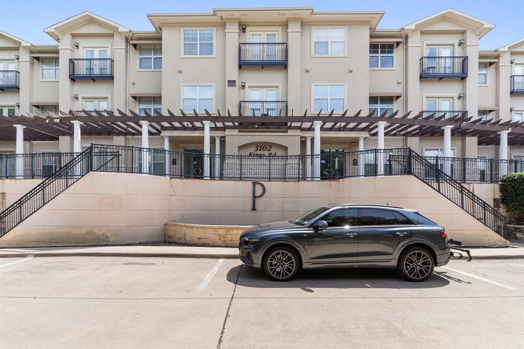 3102 Kings Road, Unit 1106 Dallas, TX 75219 - Photo 2 of 20 a view of a car parked in front of a building