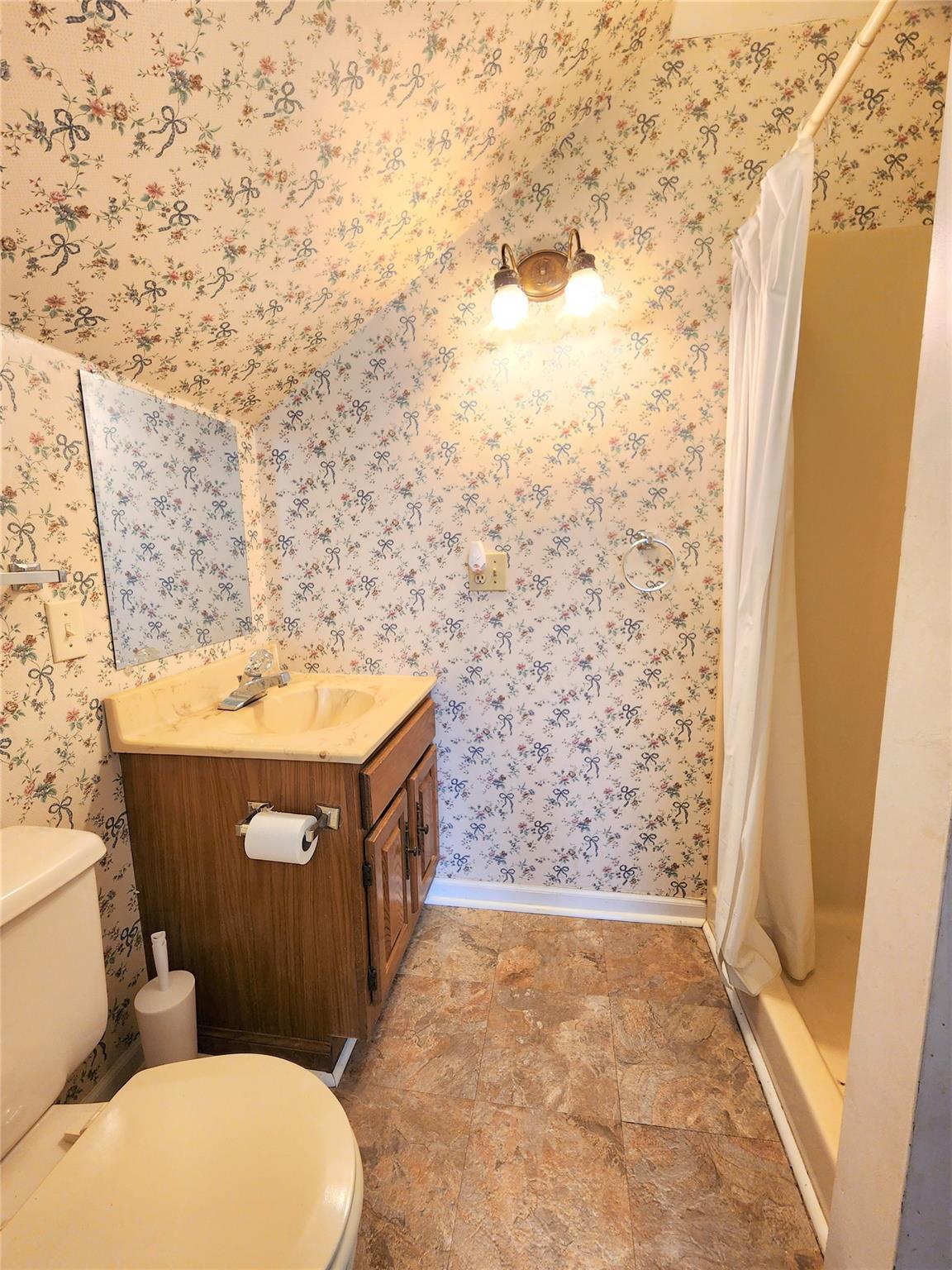 5542 Wagoner Road Gold Hill, NC 28071 - Photo 20 of 34 a bathroom with a toilet and a shower
