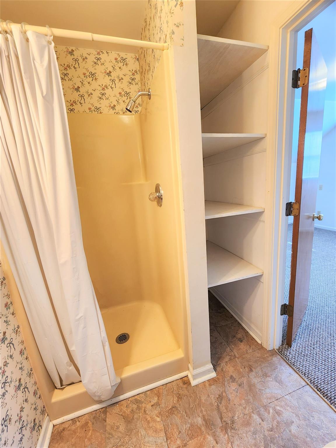 5542 Wagoner Road Gold Hill, NC 28071 - Photo 21 of 34 a bathroom with a tub and shower
