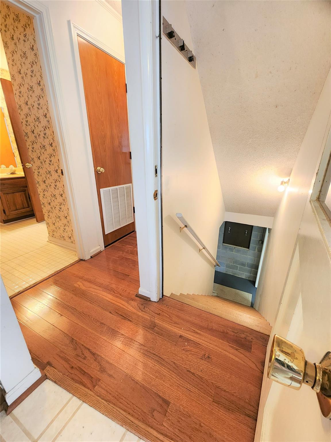 5542 Wagoner Road Gold Hill, NC 28071 - Photo 24 of 34 a view of a hallway with wooden floor