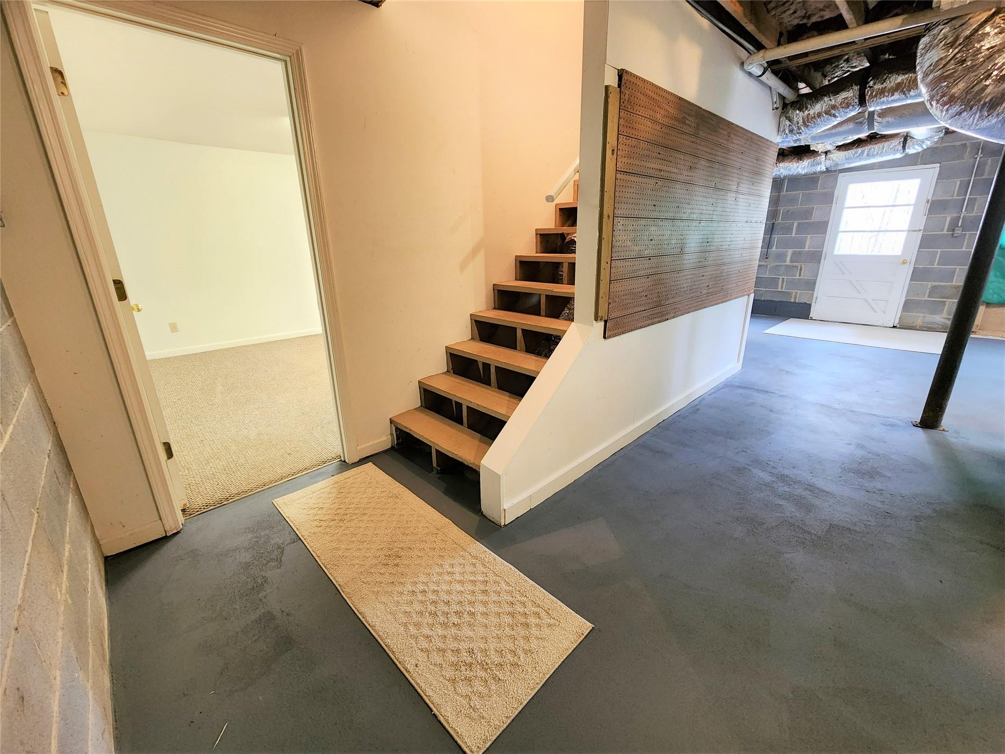 5542 Wagoner Road Gold Hill, NC 28071 - Photo 25 of 34 a view of a hallway with staircase