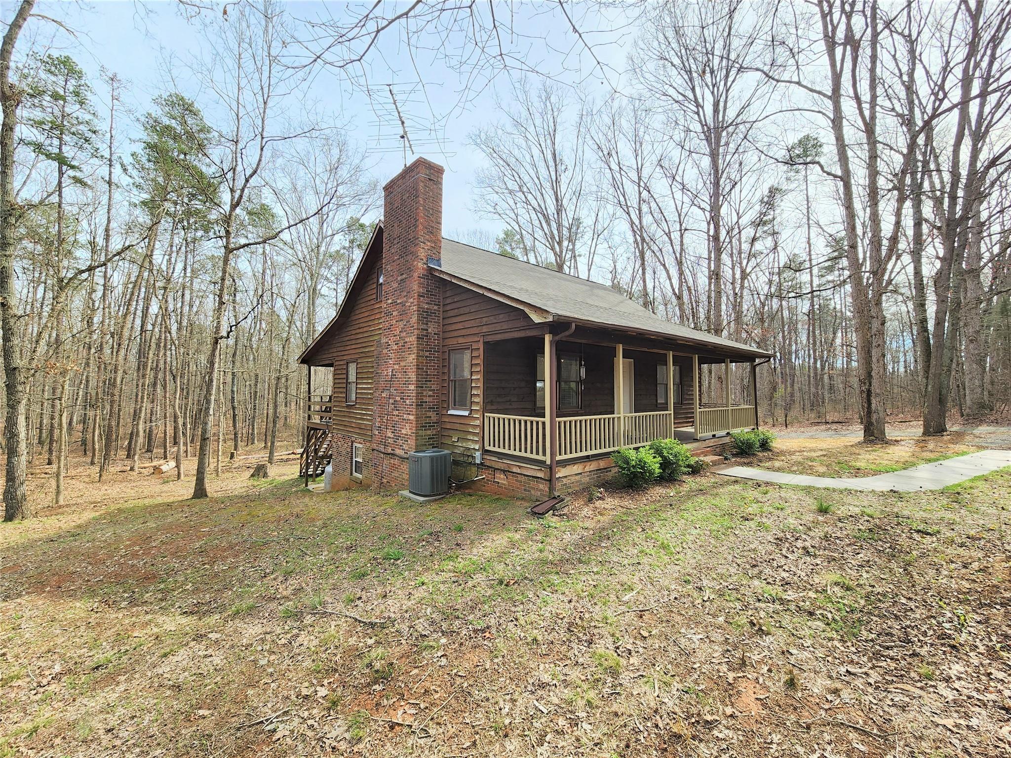 5542 Wagoner Road Gold Hill, NC 28071 - Photo 34 of 34 a view of a house with a yard