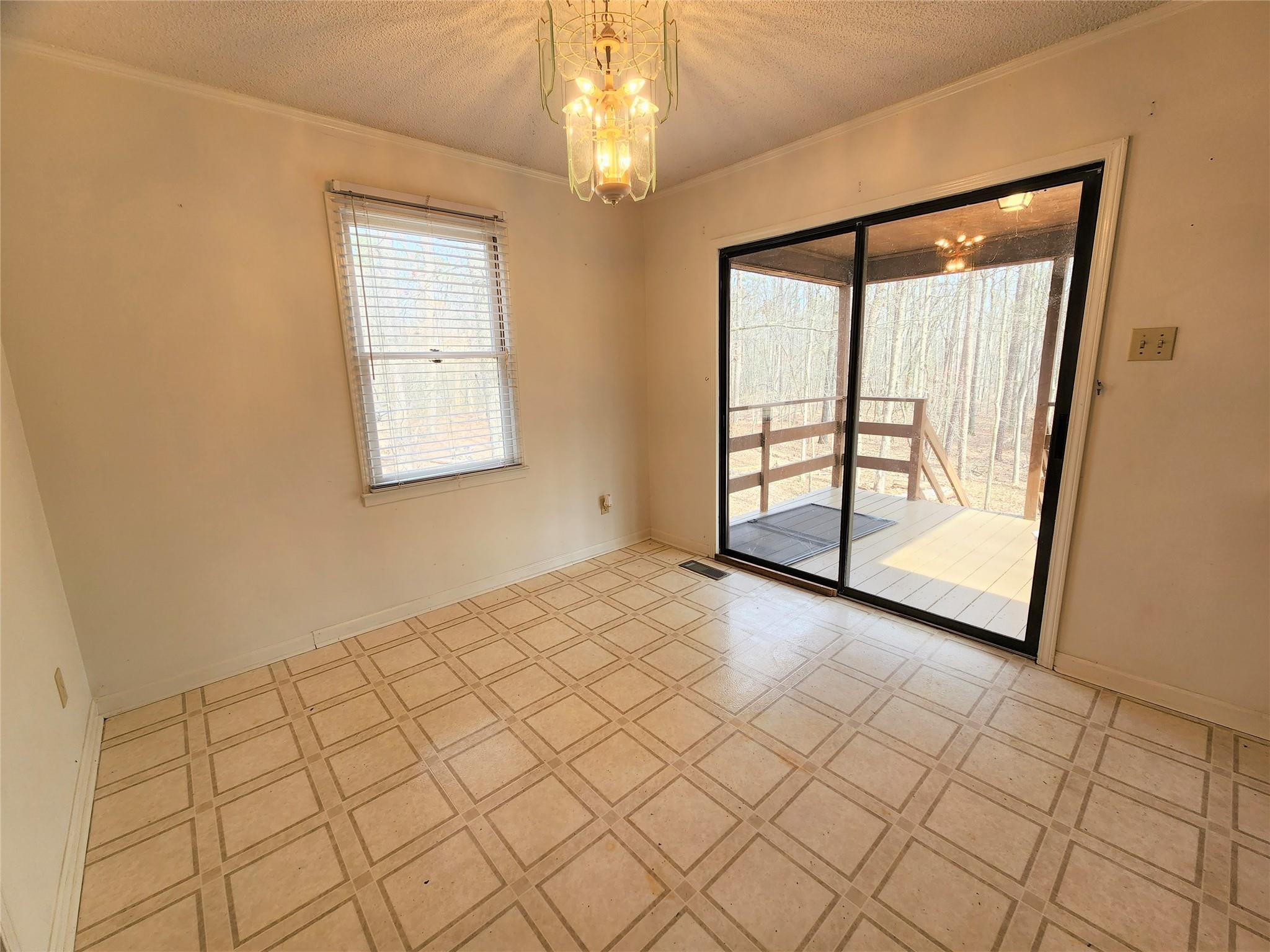 5542 Wagoner Road Gold Hill, NC 28071 - Photo 7 of 34 a view of an empty room with a window