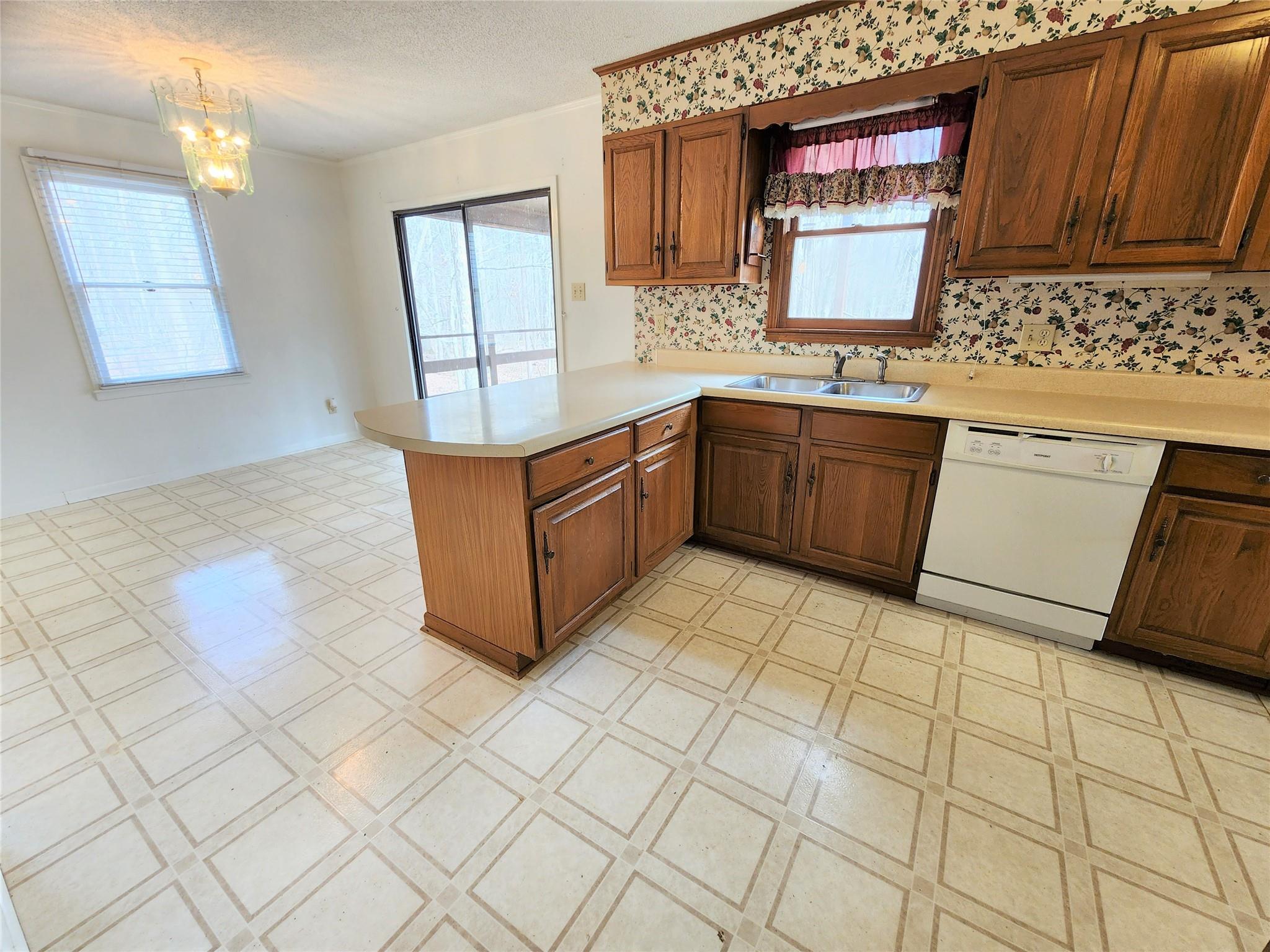 5542 Wagoner Road Gold Hill, NC 28071 - Photo 9 of 34 a kitchen with stainless steel appliances a sink and a cabinets