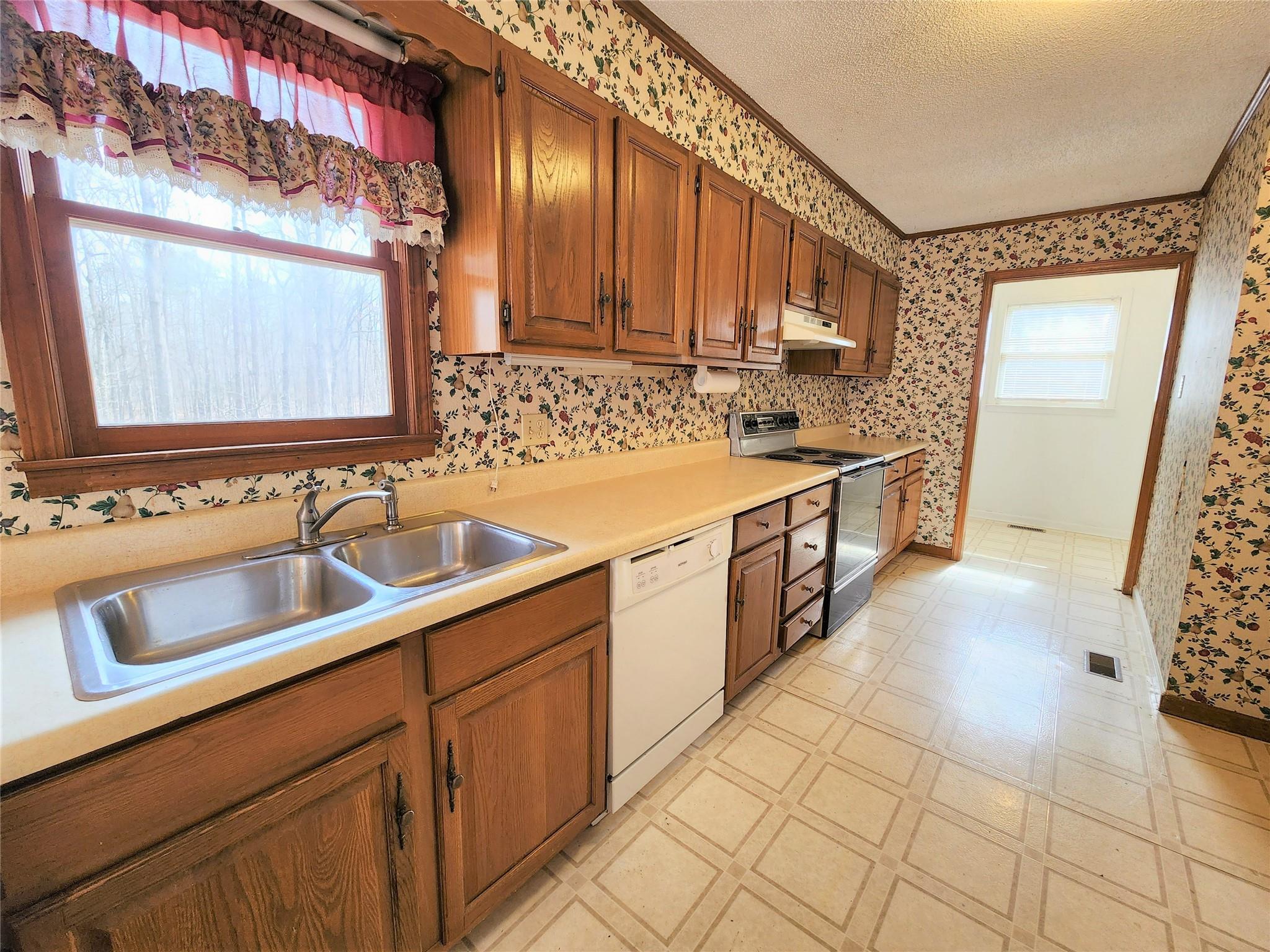 5542 Wagoner Road Gold Hill, NC 28071 - Photo 10 of 34 a kitchen with a sink and cabinets
