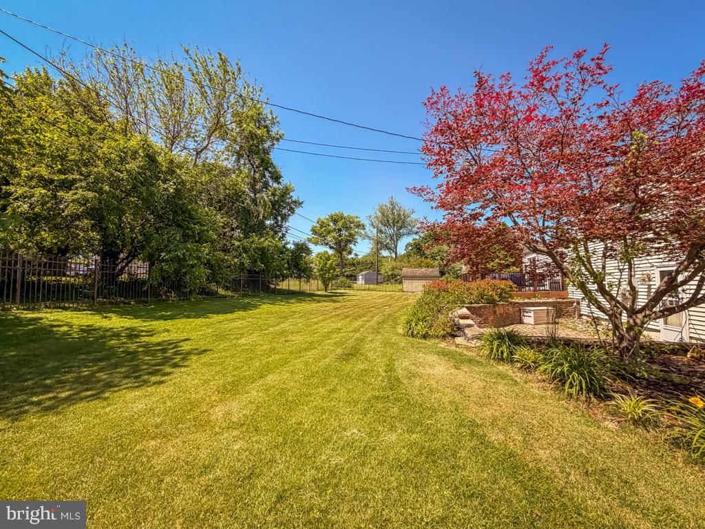925 Big Oak Road Yardley, PA 19067 - Photo 51 of 51 a view of a yard with an outdoor space