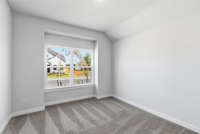 a bathroom with a granite countertop toilet a sink and a bathtub