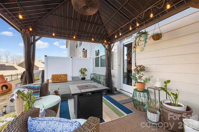 a view of a swimming pool with a yard and mountain view