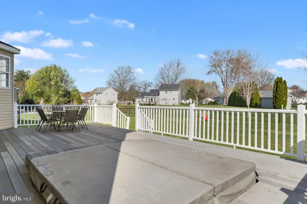 a view of a chairs and table in the patio