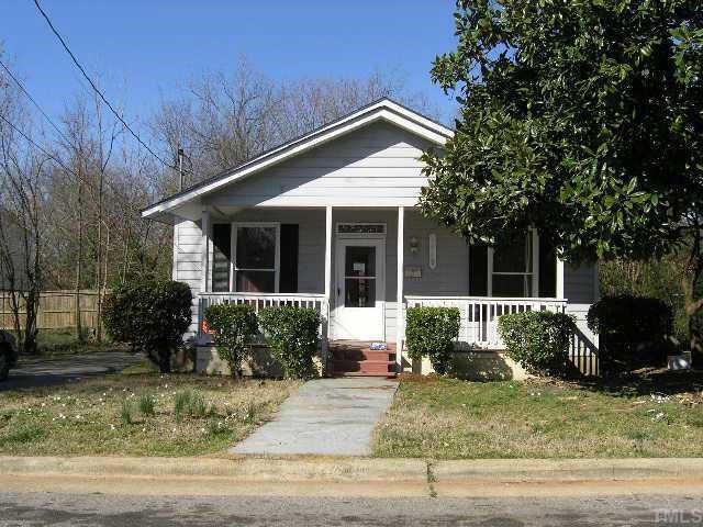 1419 Lane Street Raleigh, NC 27610 - Photo 1 of 1 a front view of a house with garden