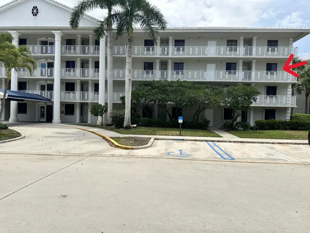 a view of a building with a street
