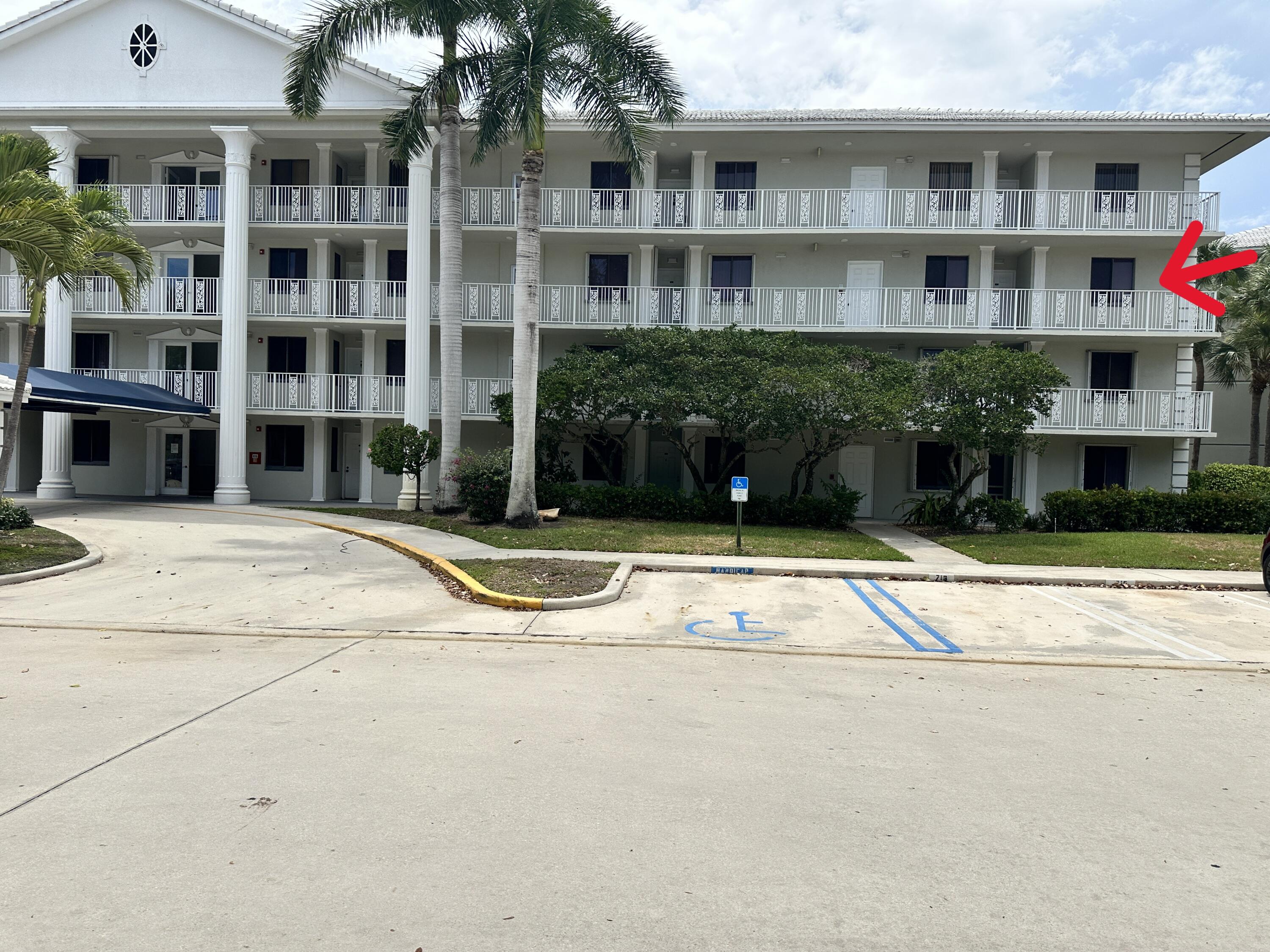 a view of a building with a street