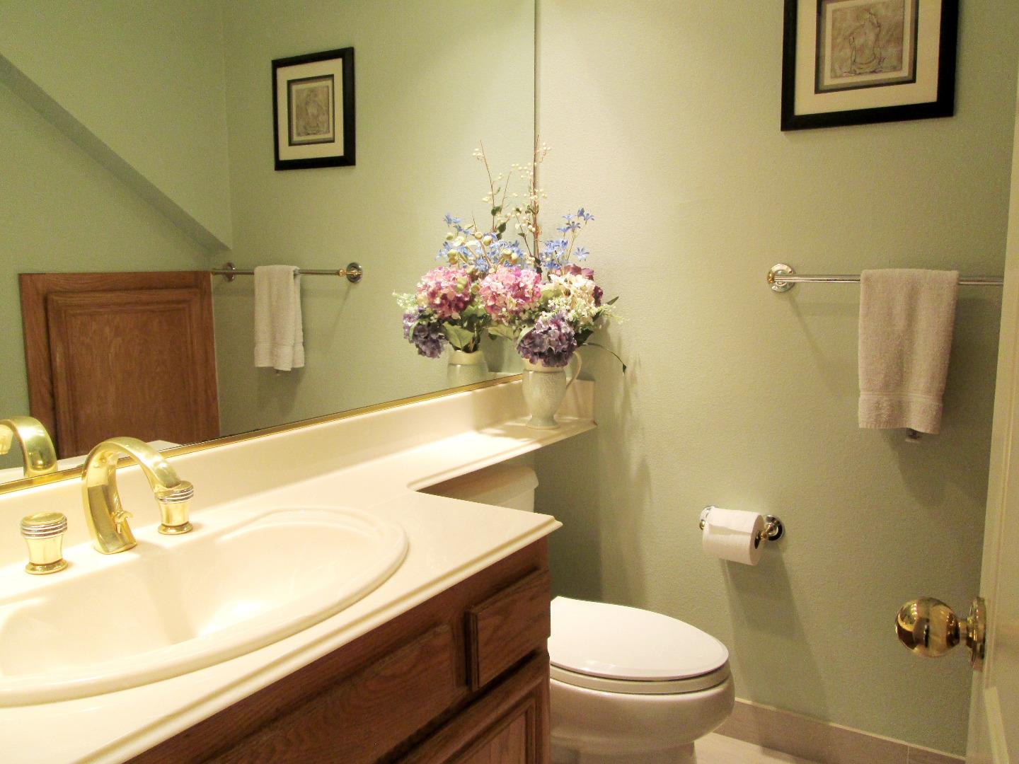2319 Skyline Drive Milpitas, CA 95035 - Photo 11 of 20 a bathroom with a sink mirror vanity and toilet