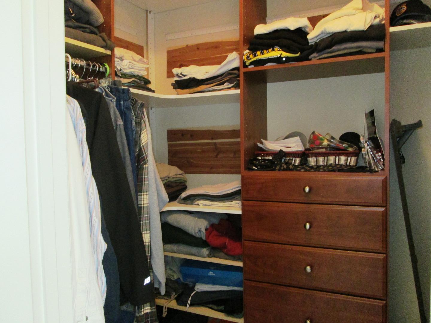 2319 Skyline Drive Milpitas, CA 95035 - Photo 16 of 20 a view of walk in closet with clothes and shoes