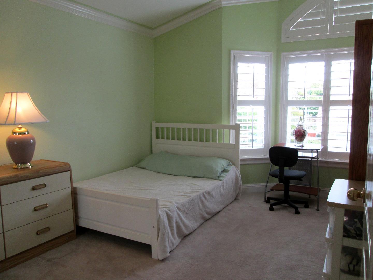 2319 Skyline Drive Milpitas, CA 95035 - Photo 17 of 20 a bedroom with a bed and large windows