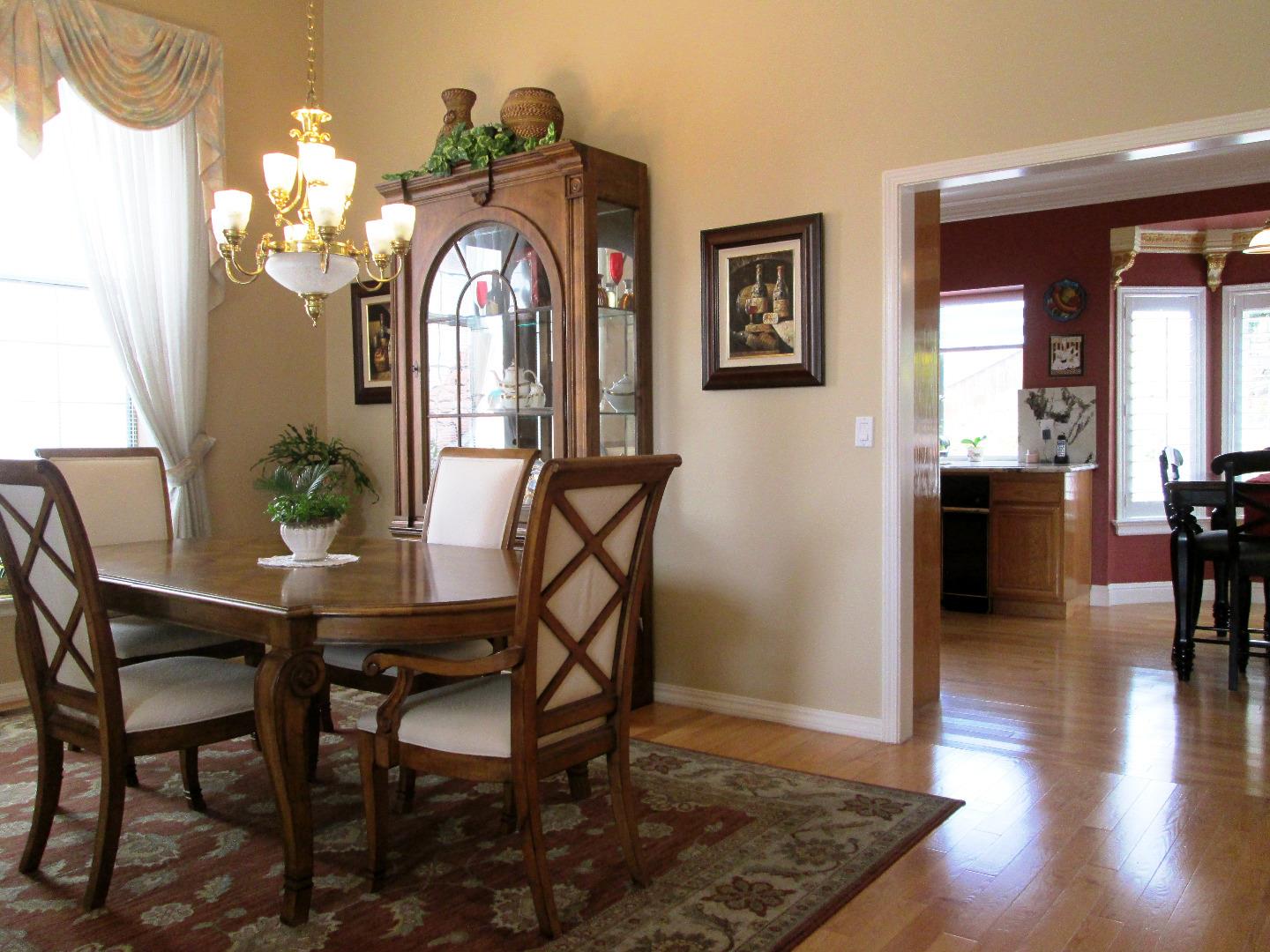 2319 Skyline Drive Milpitas, CA 95035 - Photo 4 of 20 a view of a dining room with furniture window and wooden floor