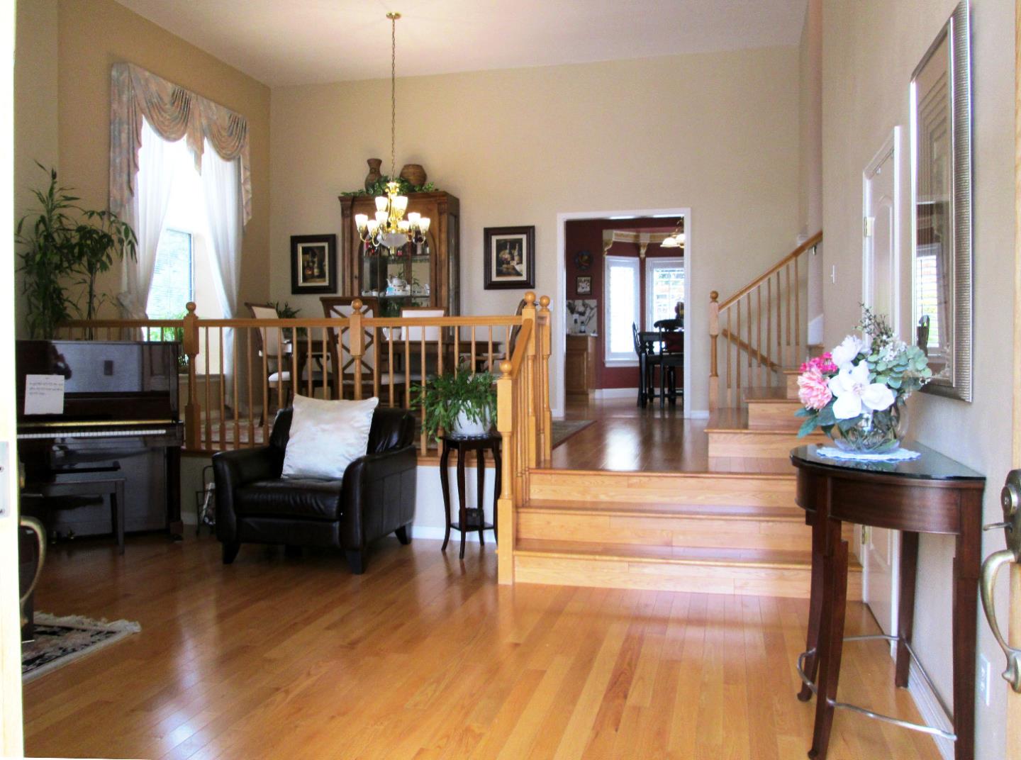 2319 Skyline Drive Milpitas, CA 95035 - Photo 6 of 20 a view of a dining room with furniture a chandelier and wooden floor