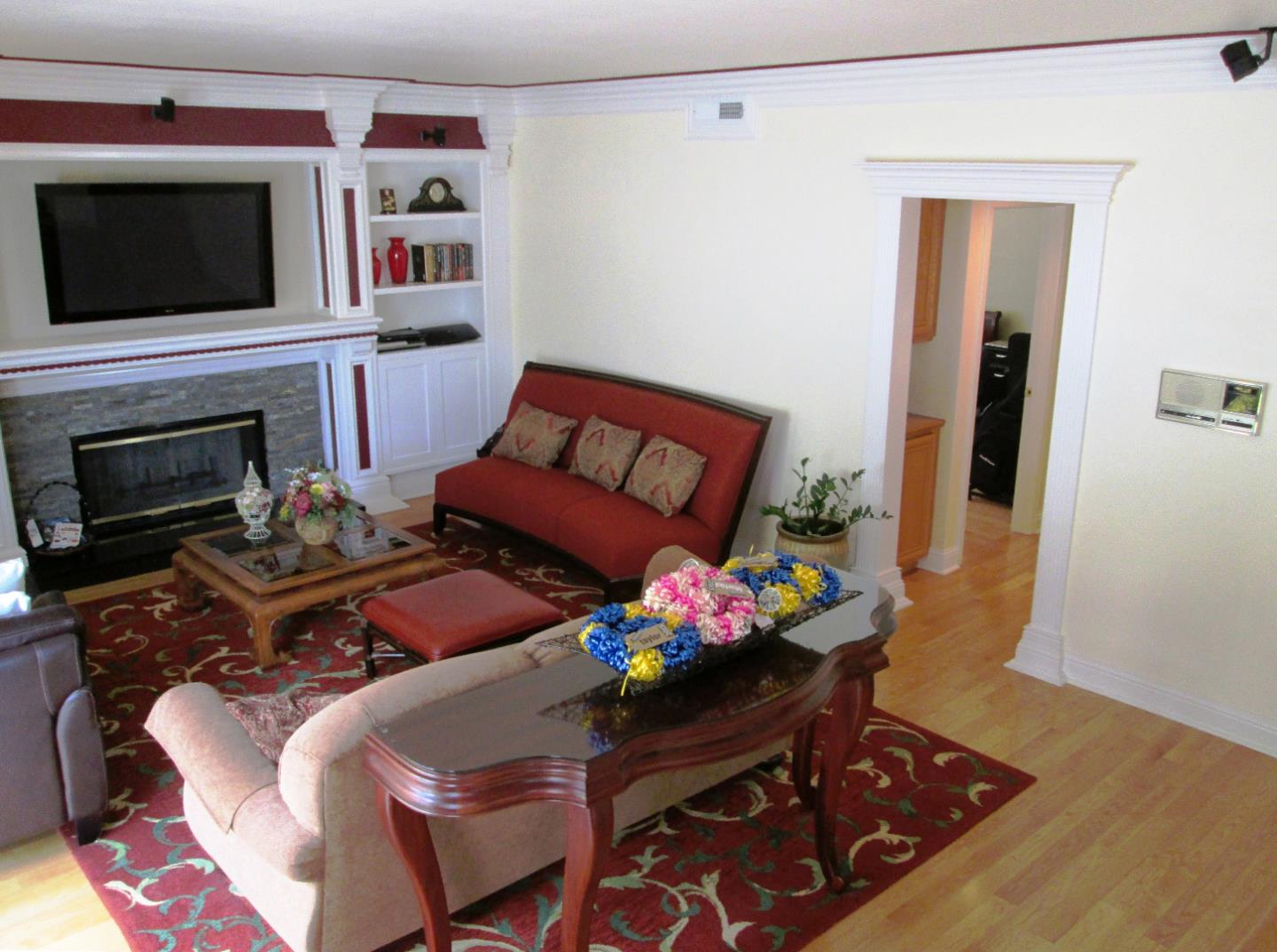 2319 Skyline Drive Milpitas, CA 95035 - Photo 9 of 20 a living room with furniture fireplace and flat screen tv
