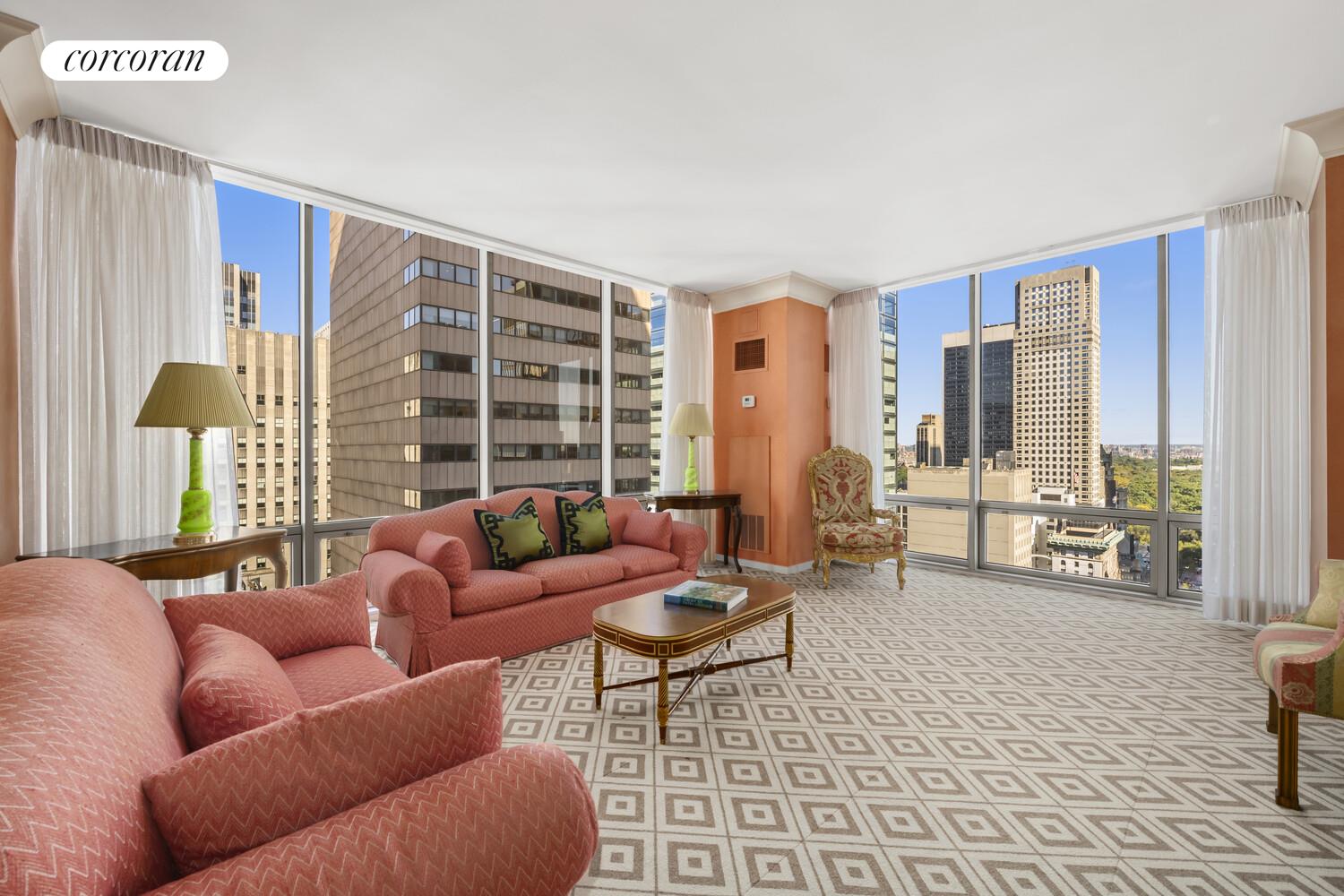 641 5th Avenue, Unit 28A Manhattan, NY 10022 - Photo 11 of 16 a living room with furniture and a large window