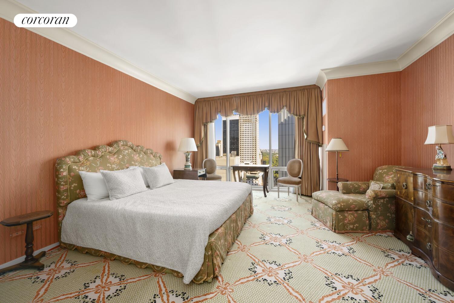 641 5th Avenue, Unit 28A Manhattan, NY 10022 - Photo 14 of 16 a bedroom with furniture and a large mirror