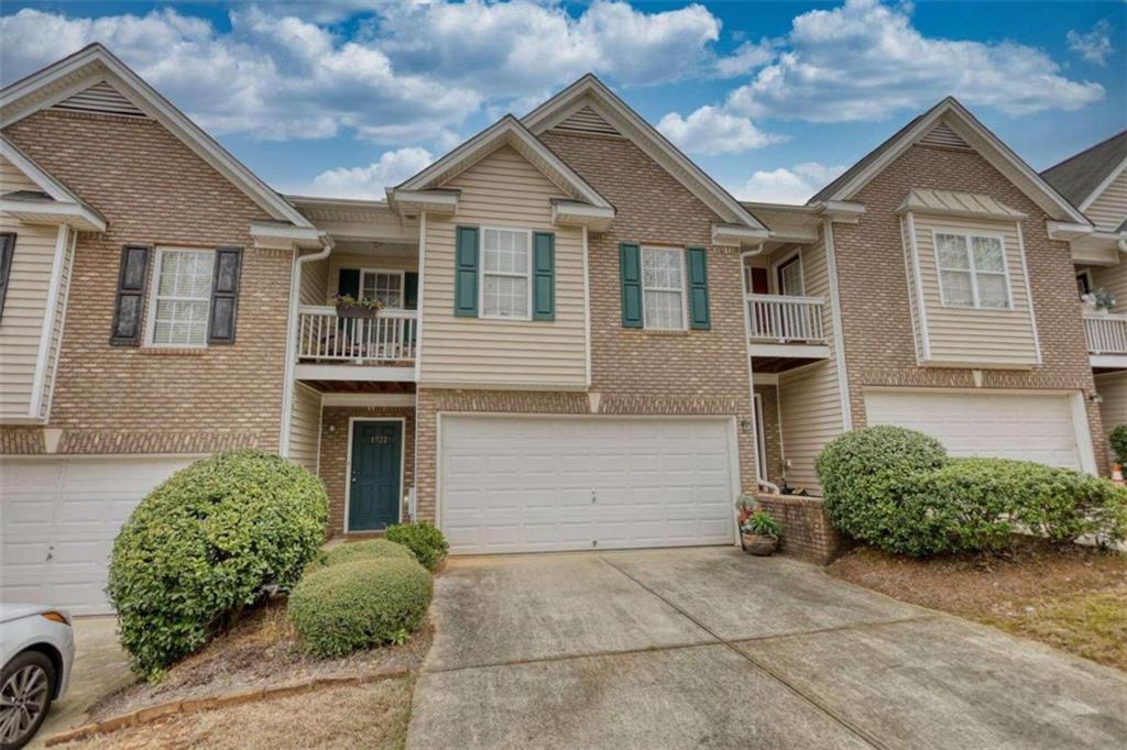 1972 Manhattan Parkway Decatur, GA 30035 - Photo 1 of 1 a front view of a house with garden