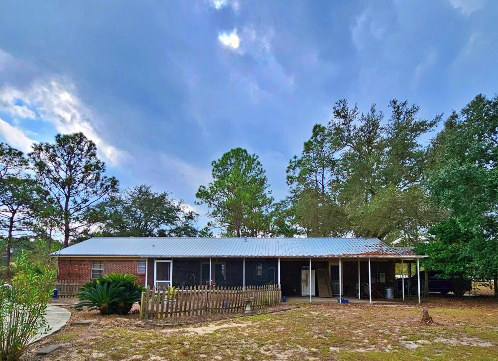 4017 Bear Creek Road Crestview, FL 32539 - Photo 24 of 30 front view of a house with a yard