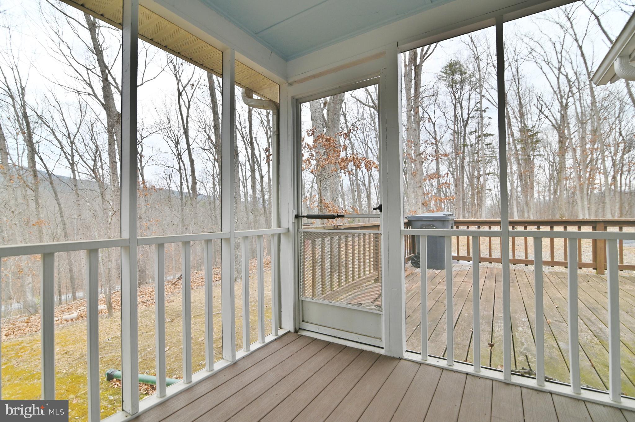 67 Plum Tree Lane Fort Valley, VA 22652 - Photo 15 of 47 a view of wooden balcony